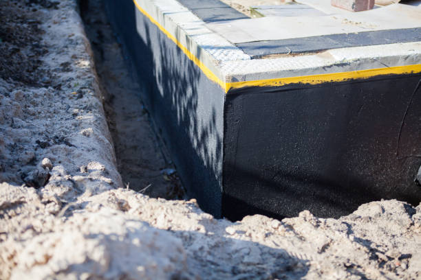 Professional Waterproofing technician working in Hickman, KY
